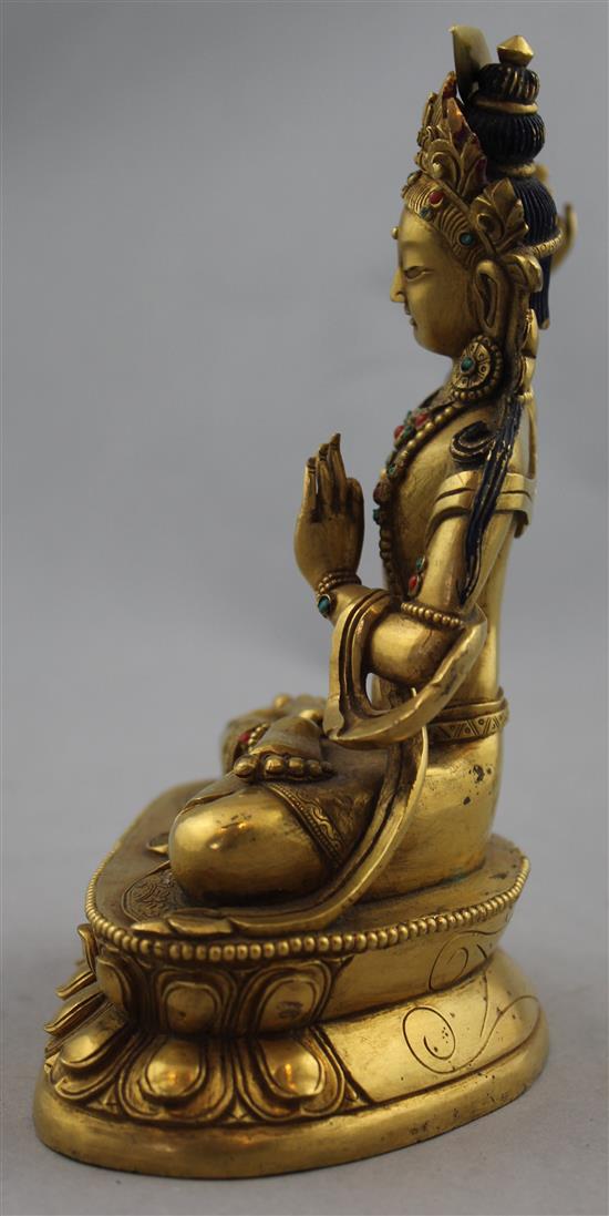 A Sino-Tibetan gilt bronze seated figure of Manjushri, 19cm